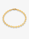 Gold bracelet by Rachel Jackson on a white background