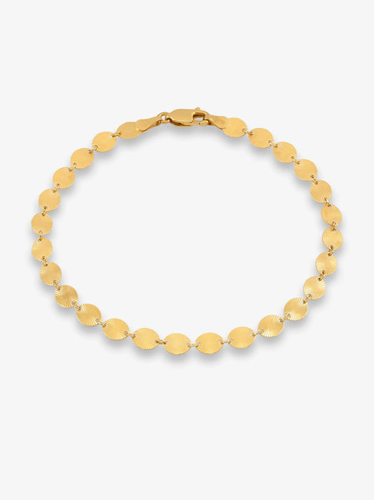 Gold bracelet by Rachel Jackson on a white background
