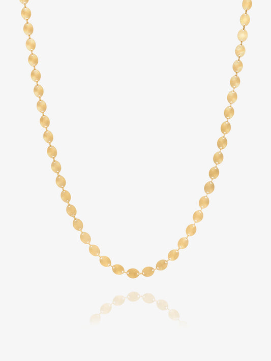 Gold chain necklace by Rachel Jackson on white background