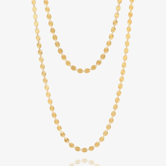Gold LONG necklace on a white background