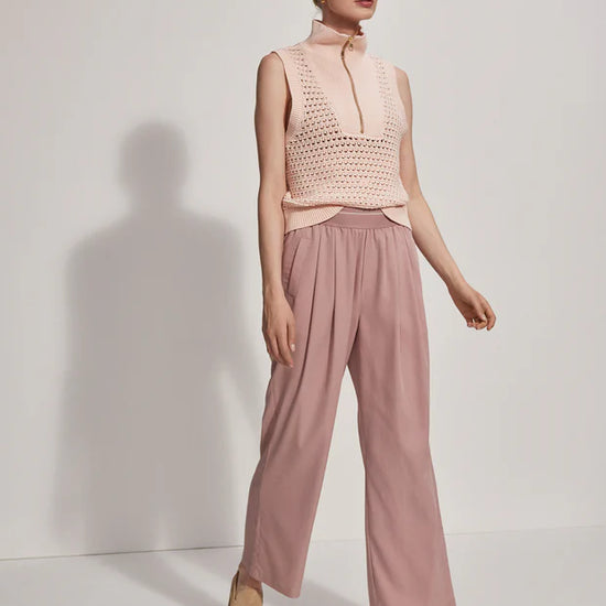 Sleeveless pointelle knit in pale pink with a half zip