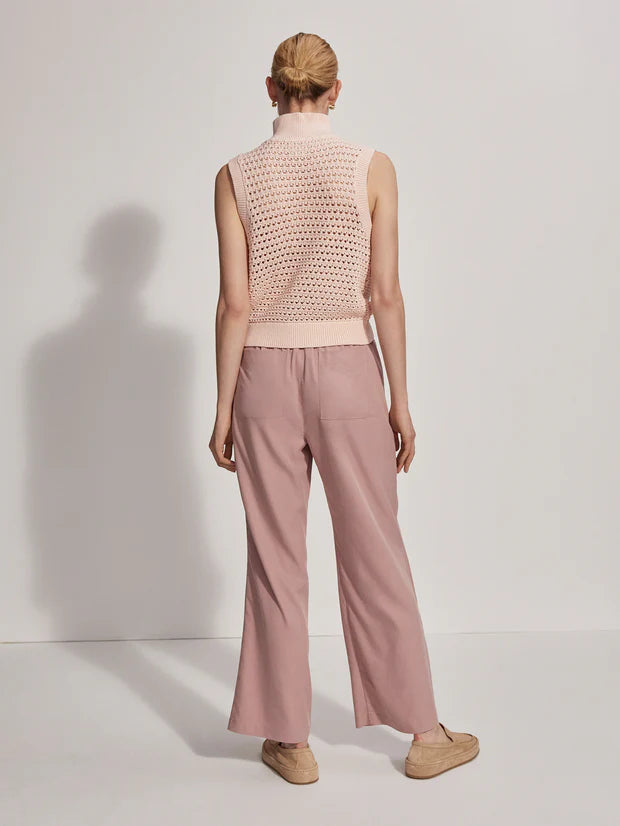 Sleeveless pointelle knit in pale pink with a half zip rear view