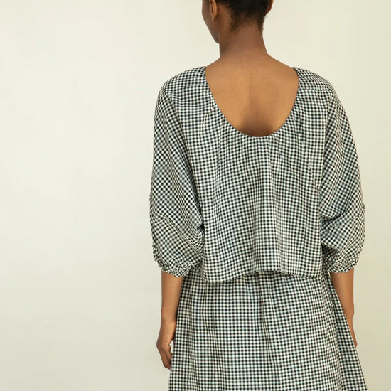 Rear view of gingham organic cotton top