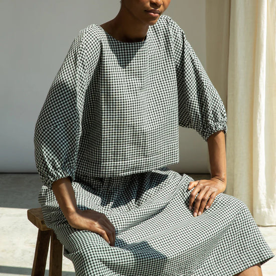 Gingham top worn with matching skirt