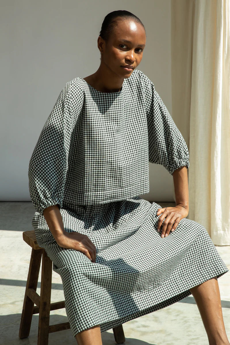 Gingham top worn with matching skirt