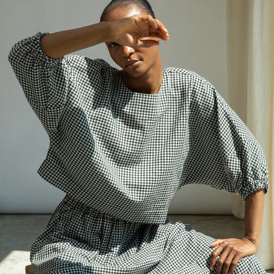 Gingham top worn with matching skirt
