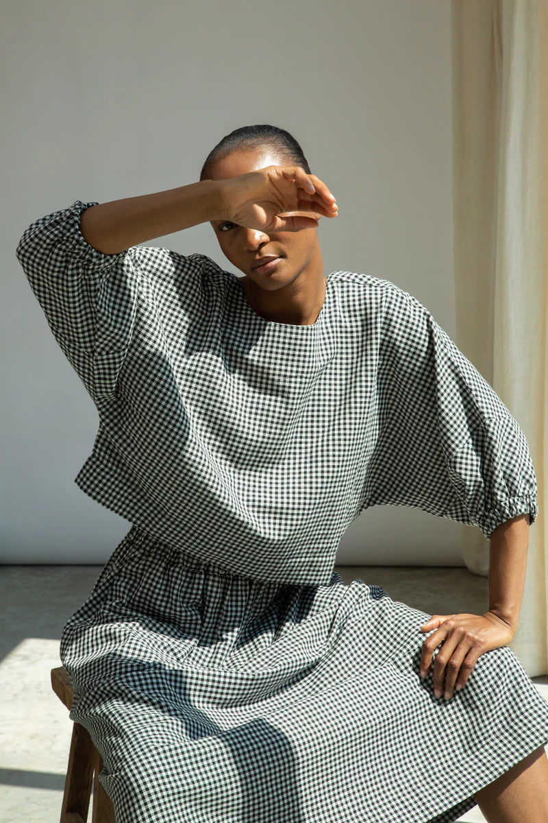 Gingham top worn with matching skirt