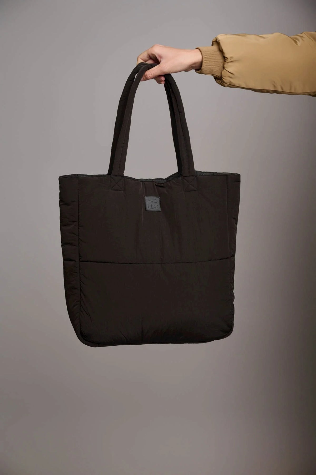 Black padded shopper bag