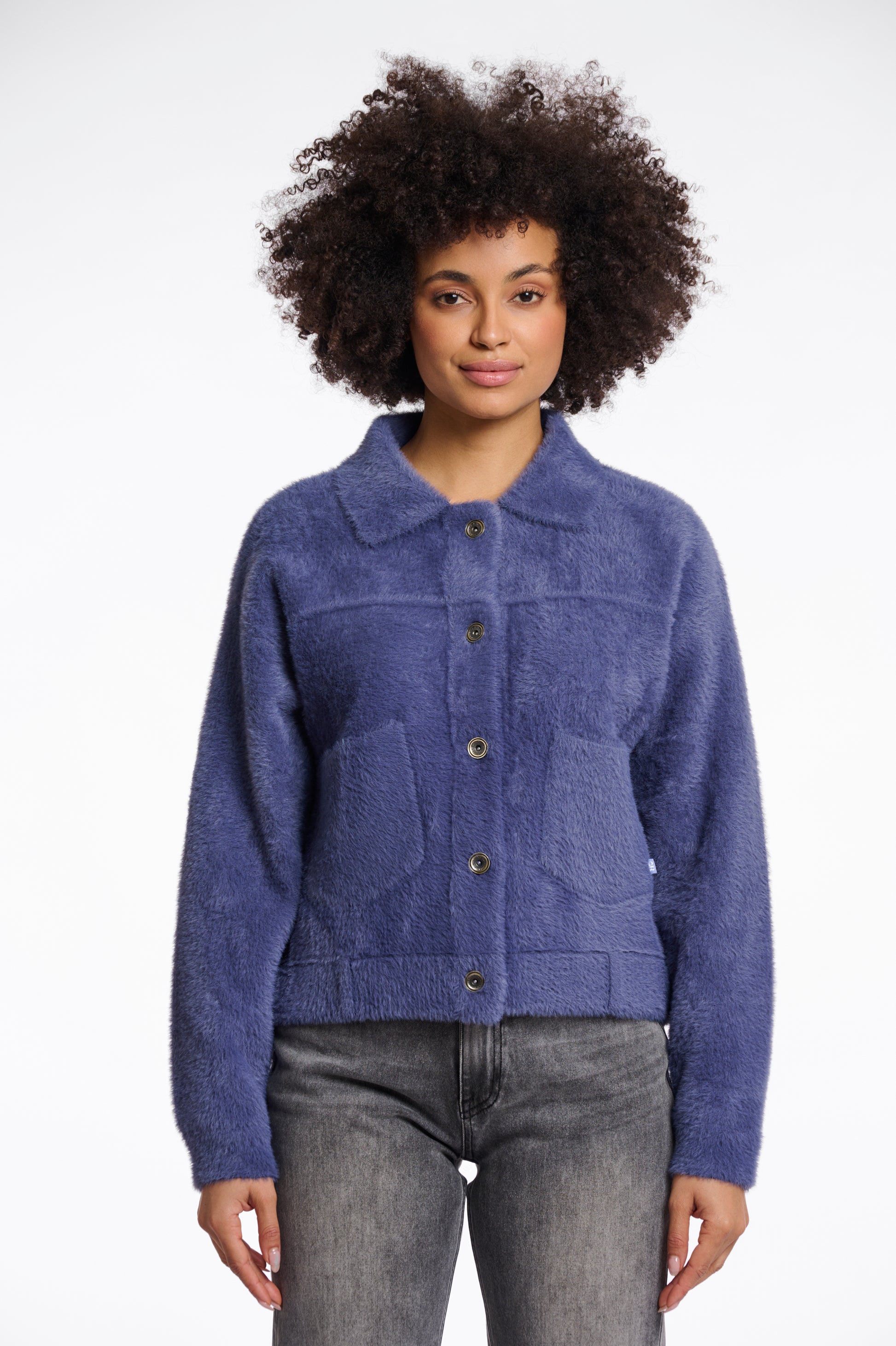 short fluffy blue jacket with collar, button down and 2 patch pockets 