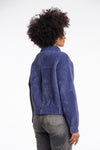 short fluffy blue jacket with collar, button down and 2 patch pockets rear view