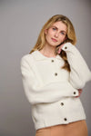 Winter white faux fur boxy cardigan jacket with patch pockets and metallic button fastenings