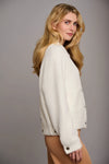 Winter white faux fur boxy cardigan jacket with patch pockets and metallic button fastenings