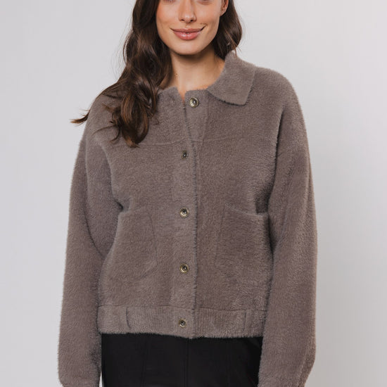 short taupe cardigan with classic collar and 2 front patch pockets 