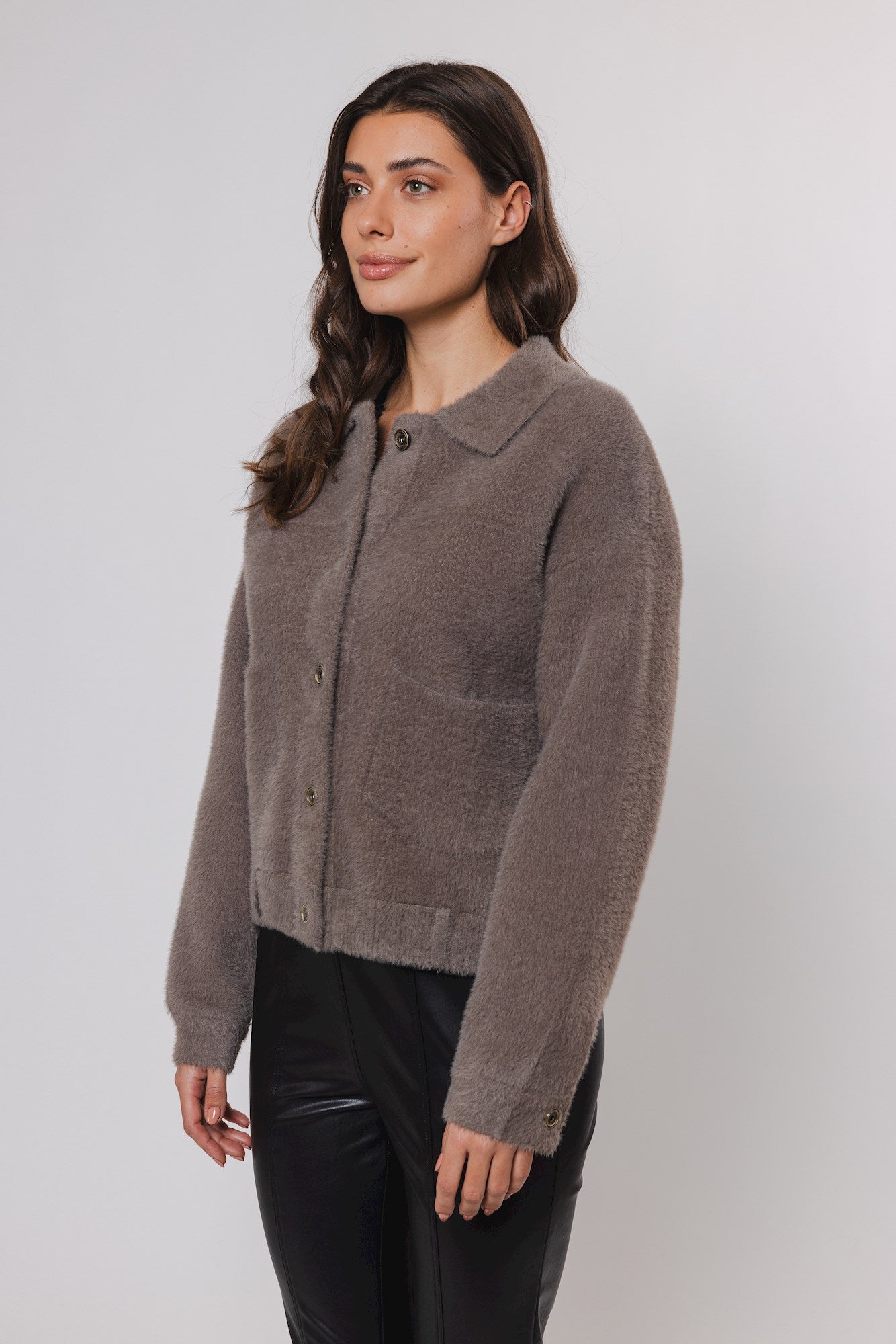 short taupe cardigan with classic collar and 2 front patch pockets  side view 