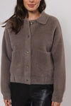 short taupe cardigan with classic collar and 2 front patch pockets  close up 