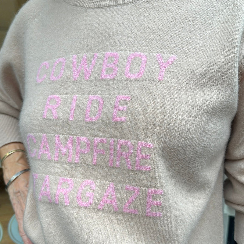 close up of embroidered text in pink