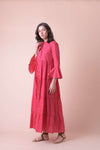 Cotton red and pink dress that buttons through with a 3/4 length sleeve