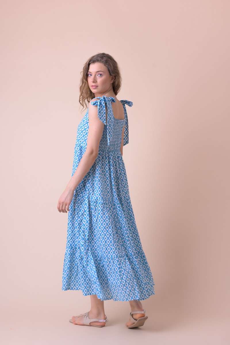 Blue cotton maxi dress with tie shoulders and a white all over tile print