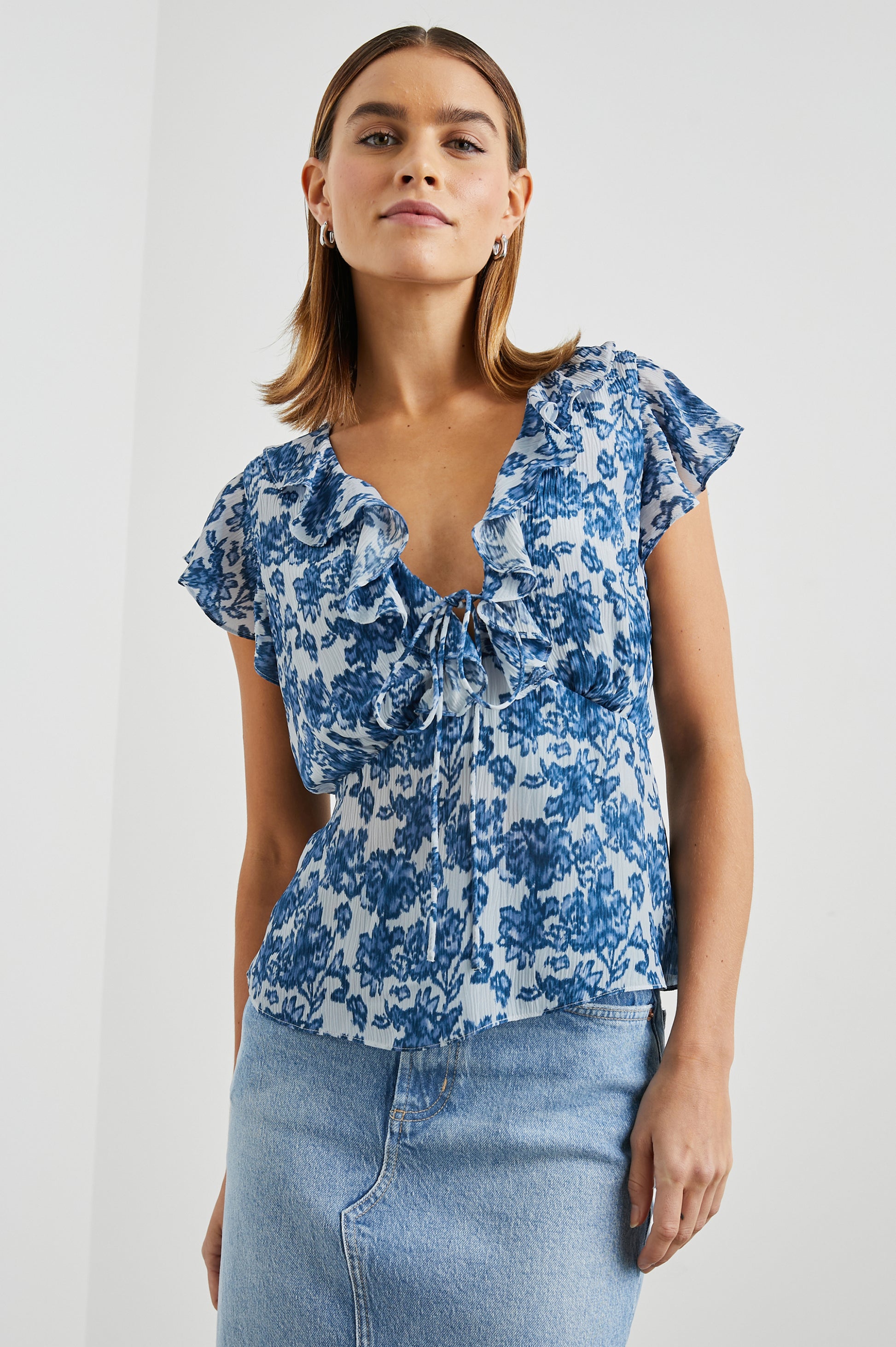 Blue floral top with cap sleeves 