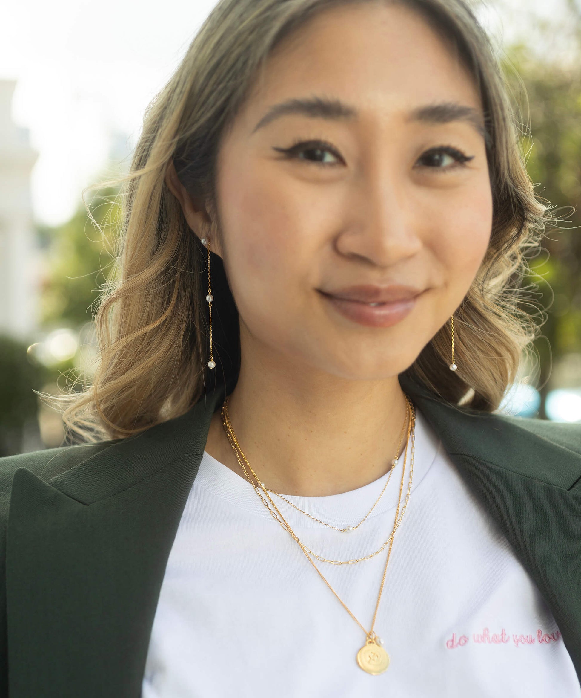 gold pearl stud earrings with 2 drop pearl chain model shot 