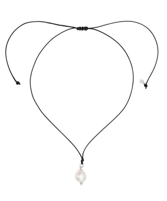 Black cord necklace with a pearl pendant on a white background