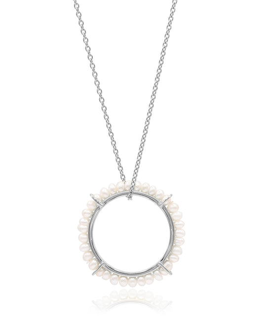Silver necklace with a circular pendant featuring small pearls on a white background