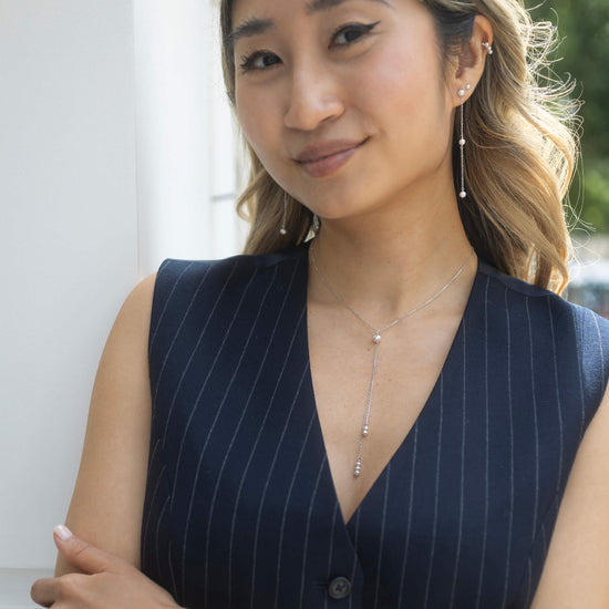 silver pearl lariat necklace model shot