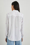 Classic white linen blend shirt featuring an embroidered scattered palm tree design in hot pink rear view