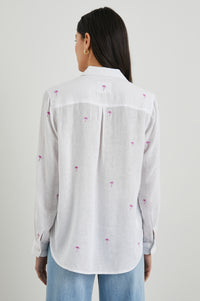 Classic white linen blend shirt featuring an embroidered scattered palm tree design in hot pink rear view