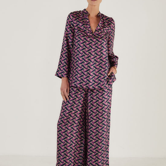 Silk printed tunic top worn with matching wide leg trousers from Mondo Corsini