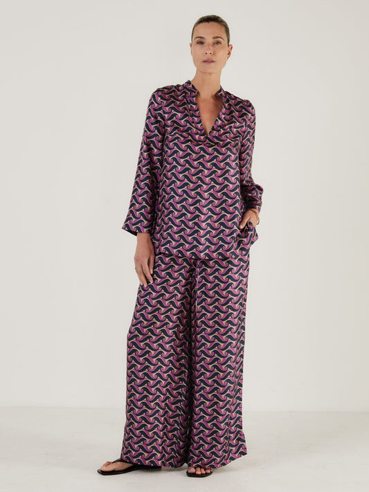 Silk printed tunic top worn with matching wide leg trousers from Mondo Corsini