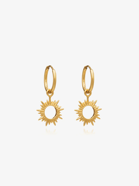 small gold huggie hoop earrings with spiky sunshine charms from rachel jackson