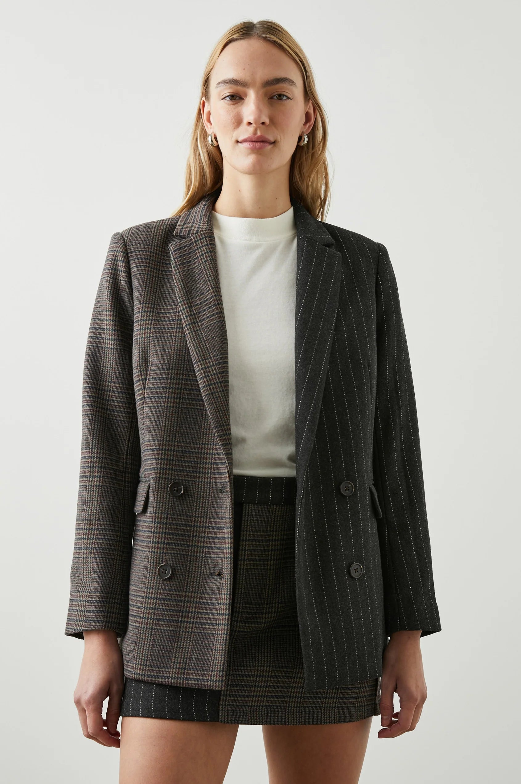 Contrast jacket with one side check design and the other pinstripe 