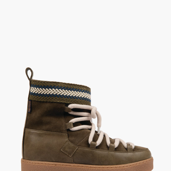 dark green short boo with wide sole, and cream lace contrast
