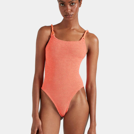 Model shot of Metallic coral swimsuit from Hunza G