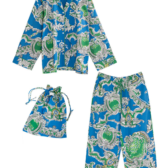 Blue and green patterned pajama set with matching drawstring bag on a white background