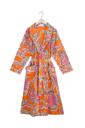 Orange patterned dress on a white background