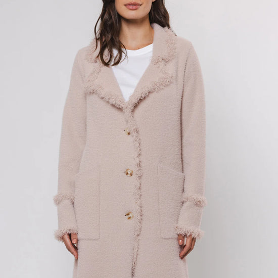 beige frayed edge long cardigan with 2 front pockets and 3 buttons