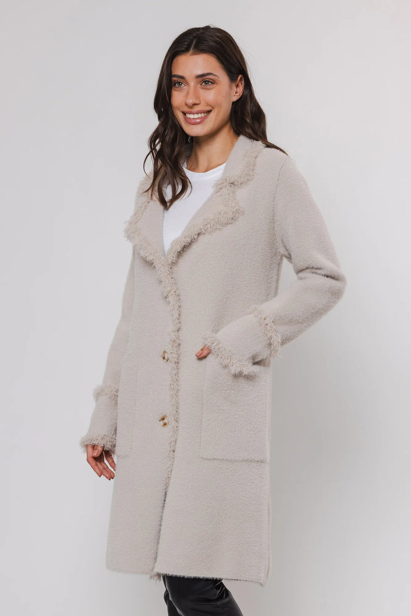 knitted long cardigan with frayed edge and 2 front pockets 