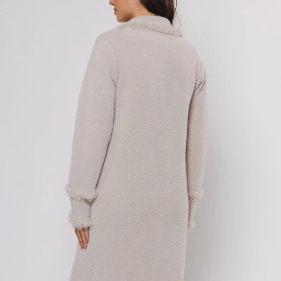 knitted long cardigan with frayed edge and 2 front pockets rear view