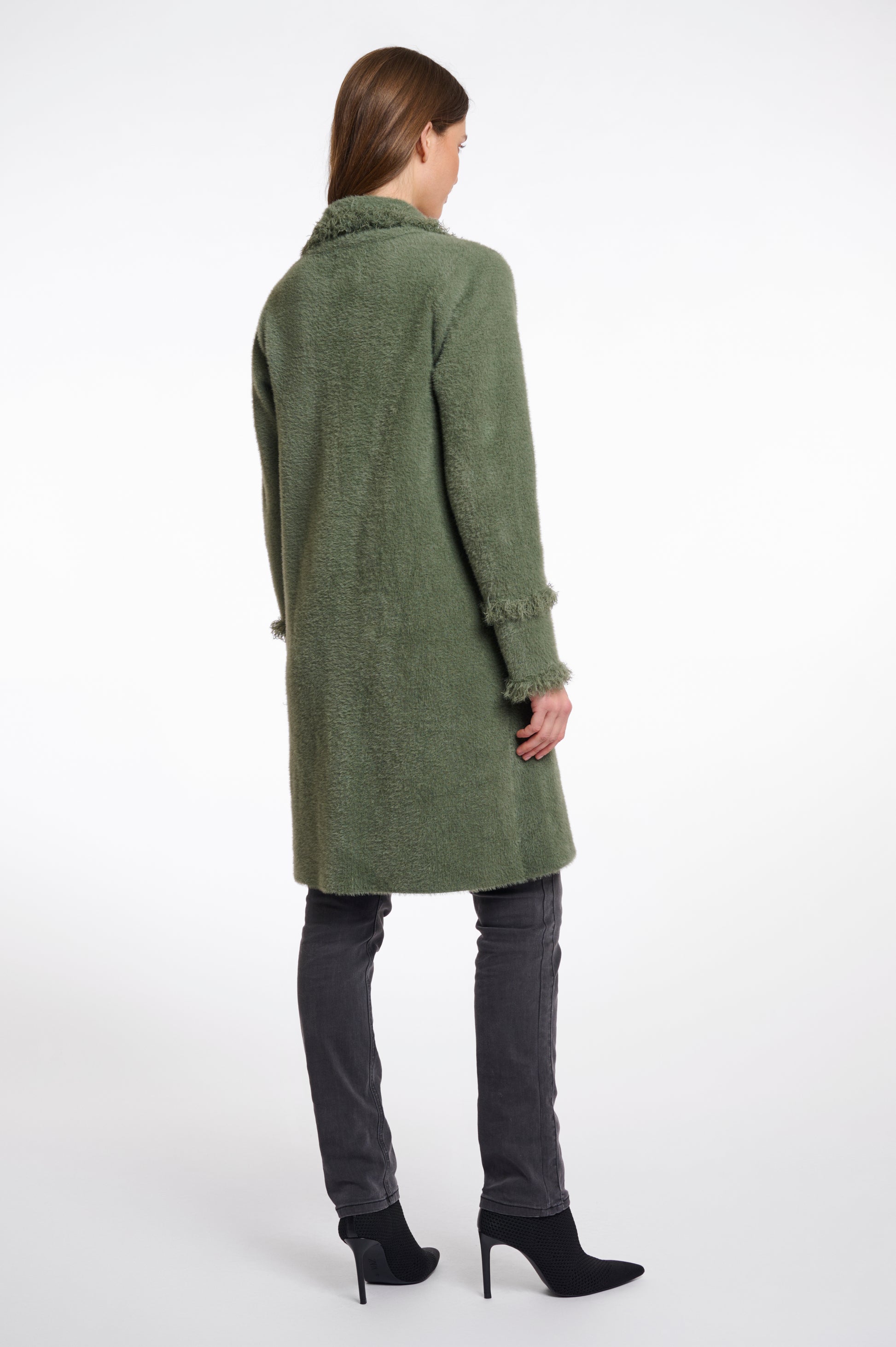 green fluffy long cardigan which comes just above the knee with fringe detailing patch pockets and long sleeves rear view 
