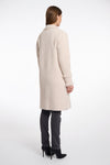 pale pink fluffy long cardigan which comes just above the knee with fringe detailing patch pockets and long sleeves rear view