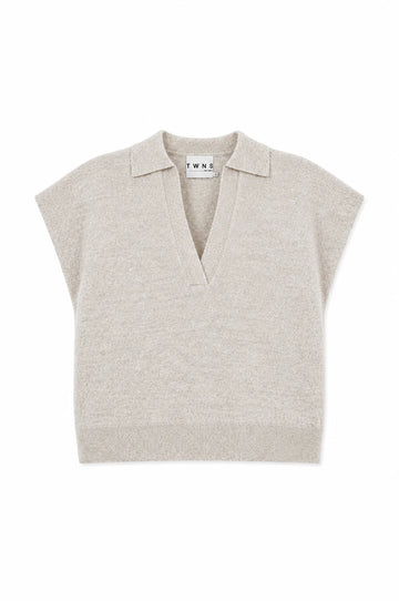A light beige knit polo sweater vest with short cap sleeves and a V-neck collar, shown flat on a white background. The brand name 'TWINE' is visible on the inner neck label.
