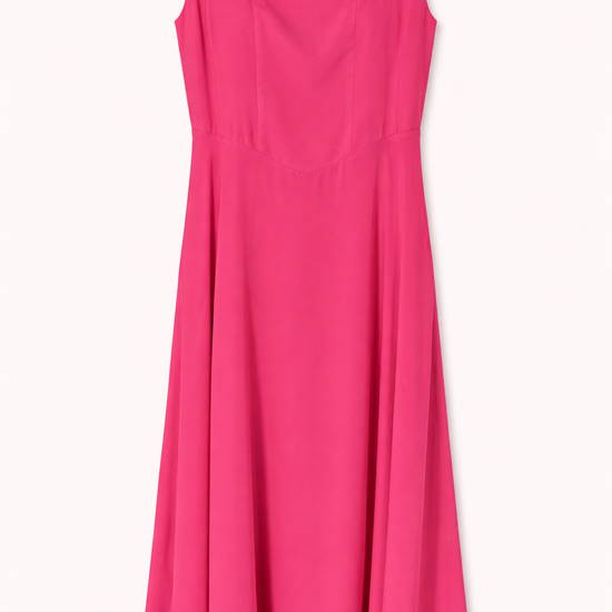 Pink dress with thin straps on a white background