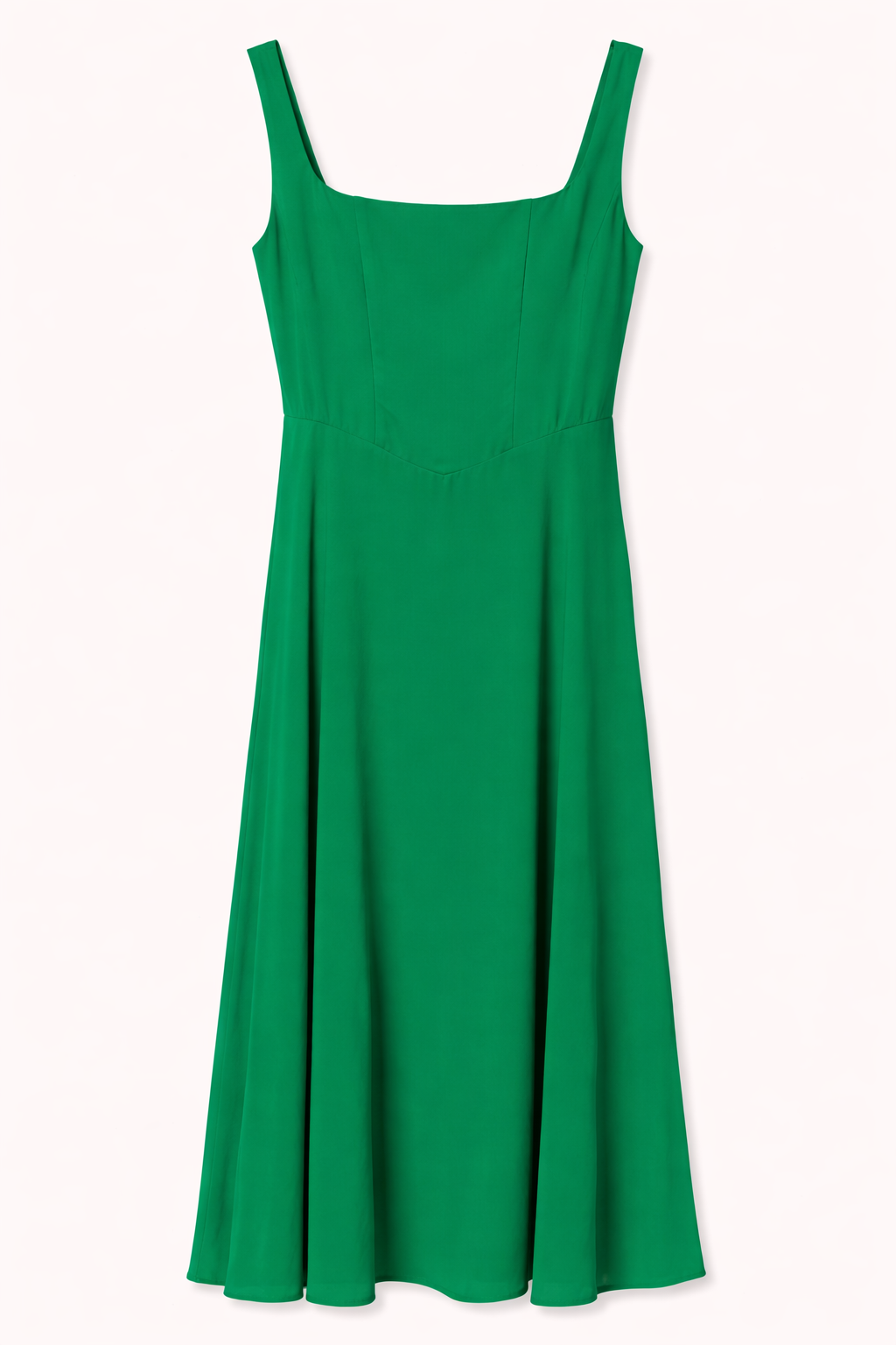 Green dress with thin straps on a white background.