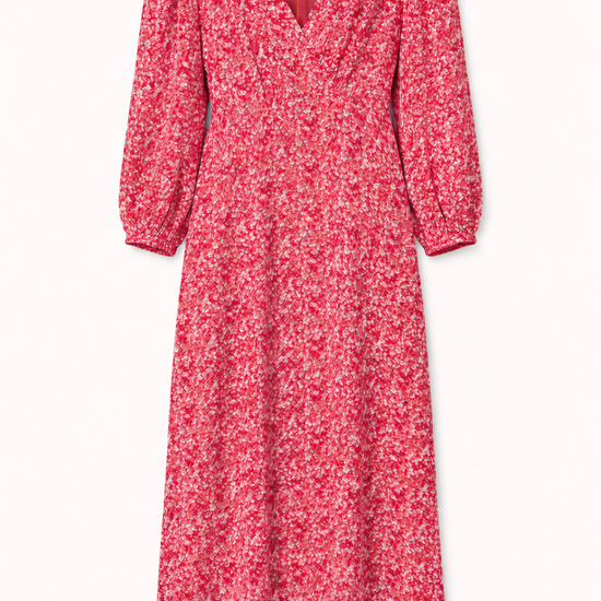 Pink floral dress with long sleeves on a white background
