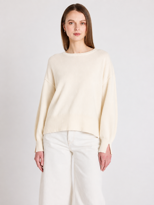 Cream cashmere round neck knit with long sleeves
