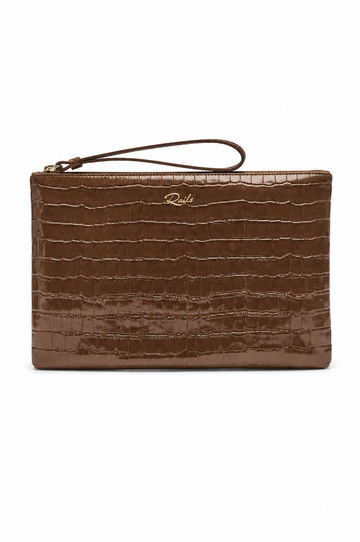 A brown crocodile-embossed leather clutch bag with a wristlet strap and a small gold 'Ricks' logo on the front, set against a plain white background.