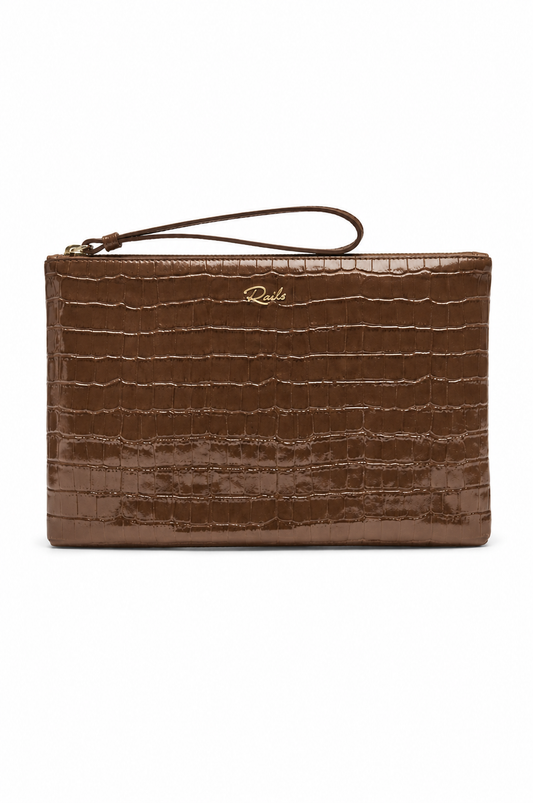 A brown crocodile-embossed leather clutch bag with a wristlet strap and a small gold 'Ricks' logo on the front, set against a plain white background.