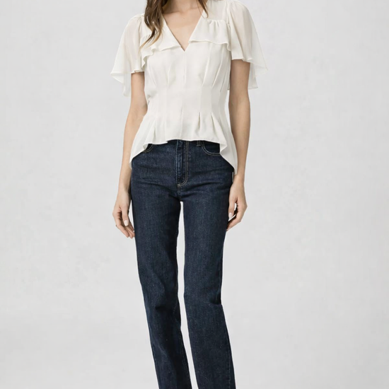 antique white short flutter sleeve blouse worn with dark denim from Paige